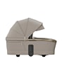 1523128110_F2_2026_maxicosi_stroller_carrycot_famecarrycot_sapphiresand_canopyextension_side